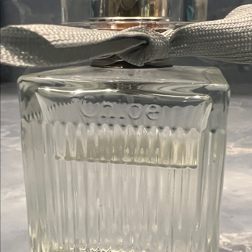 Chloé Eau de Parfum Naturelle Perfume Bottle Silver Ribbon Bow Ribbed Glass